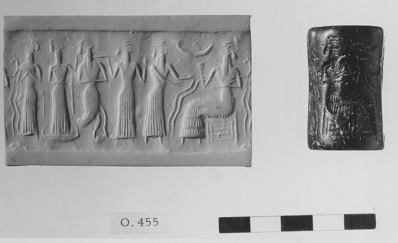 Sceau-cylindre avec divinité assise et cinq figures