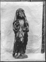 B016389