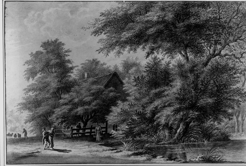Boerderij bij een rivier door bomen omgeven