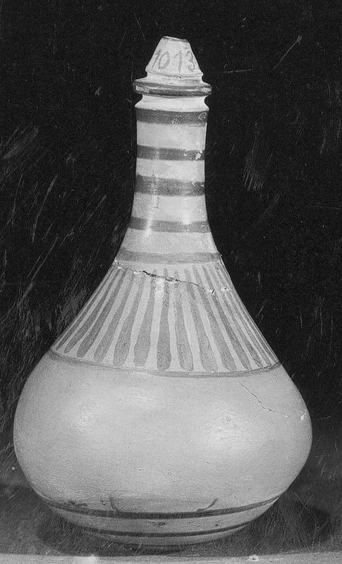 Phormiskos à figures noires : Scène d'école