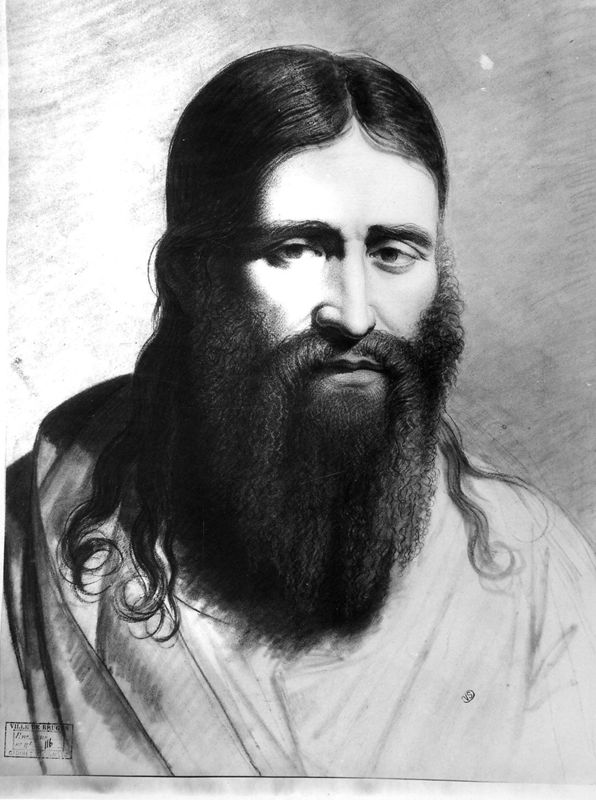 Kop van een man met volle baard