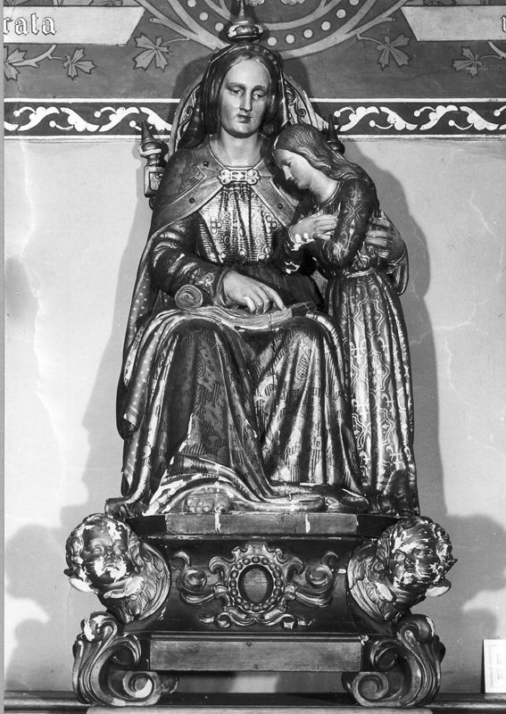 Anna leert Maria lezen