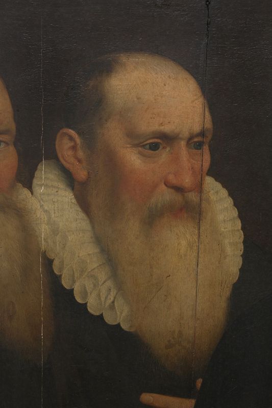 Twee panelen met elk vier mansportretten