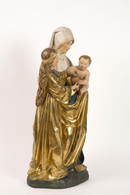 Sainte Anne, la Vierge et l'Enfant conservés dans un retable  peint