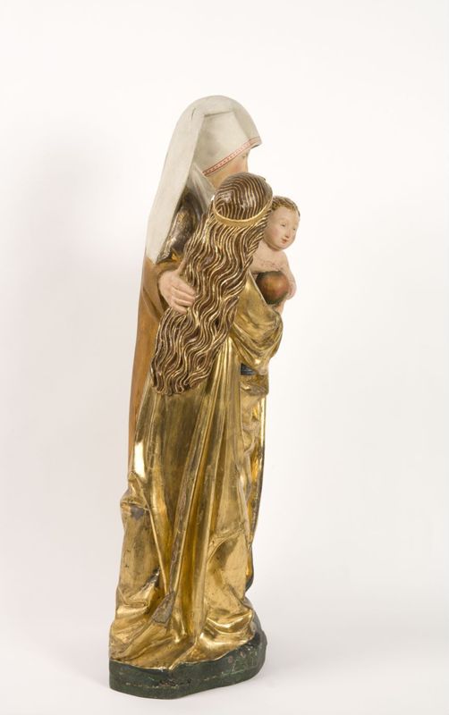 Sainte Anne, la Vierge et l'Enfant conservés dans un retable  peint