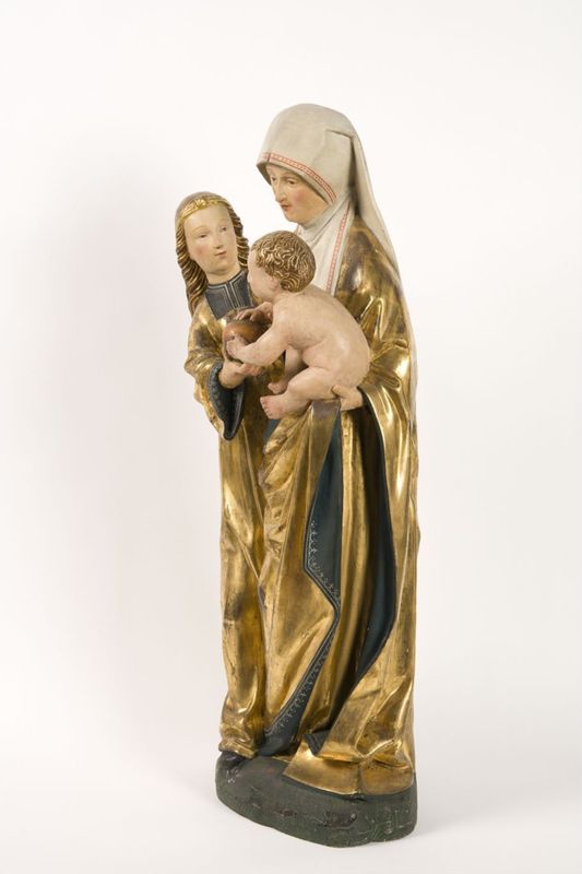 Sainte Anne, la Vierge et l'Enfant conservés dans un retable  peint