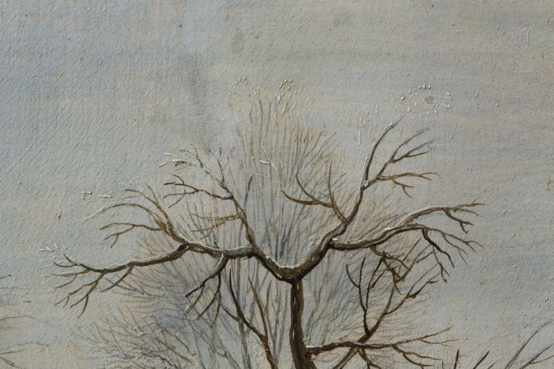 Paysage hivernal avec trappe aux oiseaux