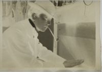 X077098
