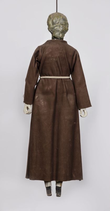 Corps de moine et tête de femme