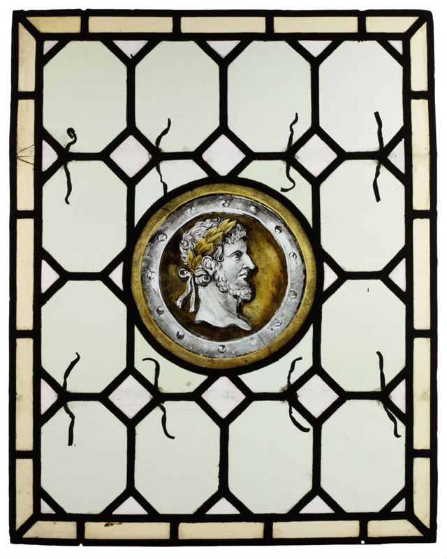 Panneau avec médaillon et tête romaine