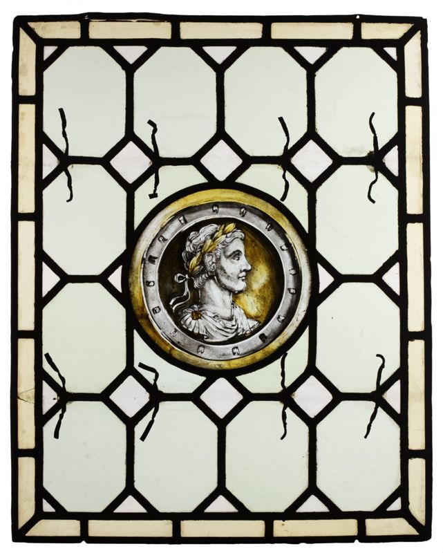 Panneau avec médaillon et tête romaine
