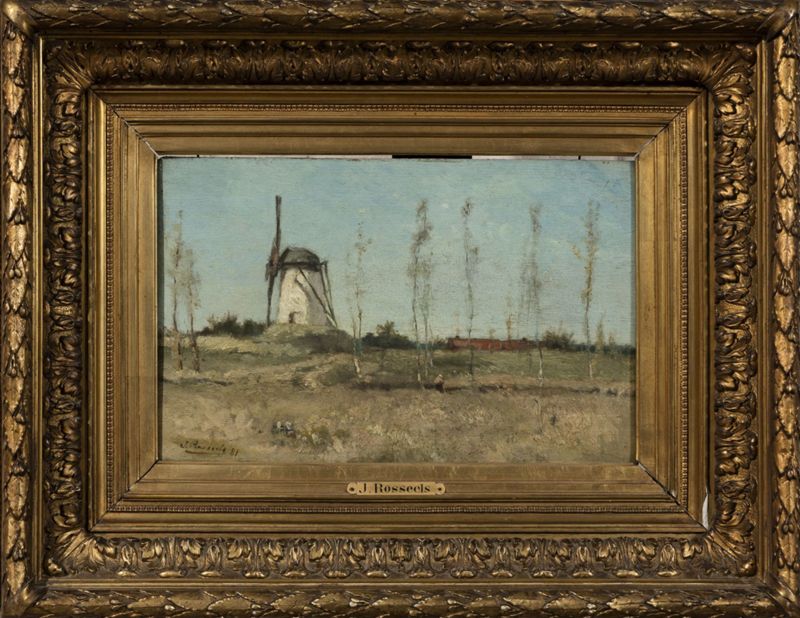 Paysan au champ près d'un moulin à vent