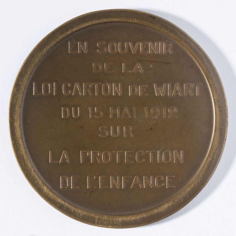 Médaille commémorant la loi sur la protection de l'enfance en Belgique